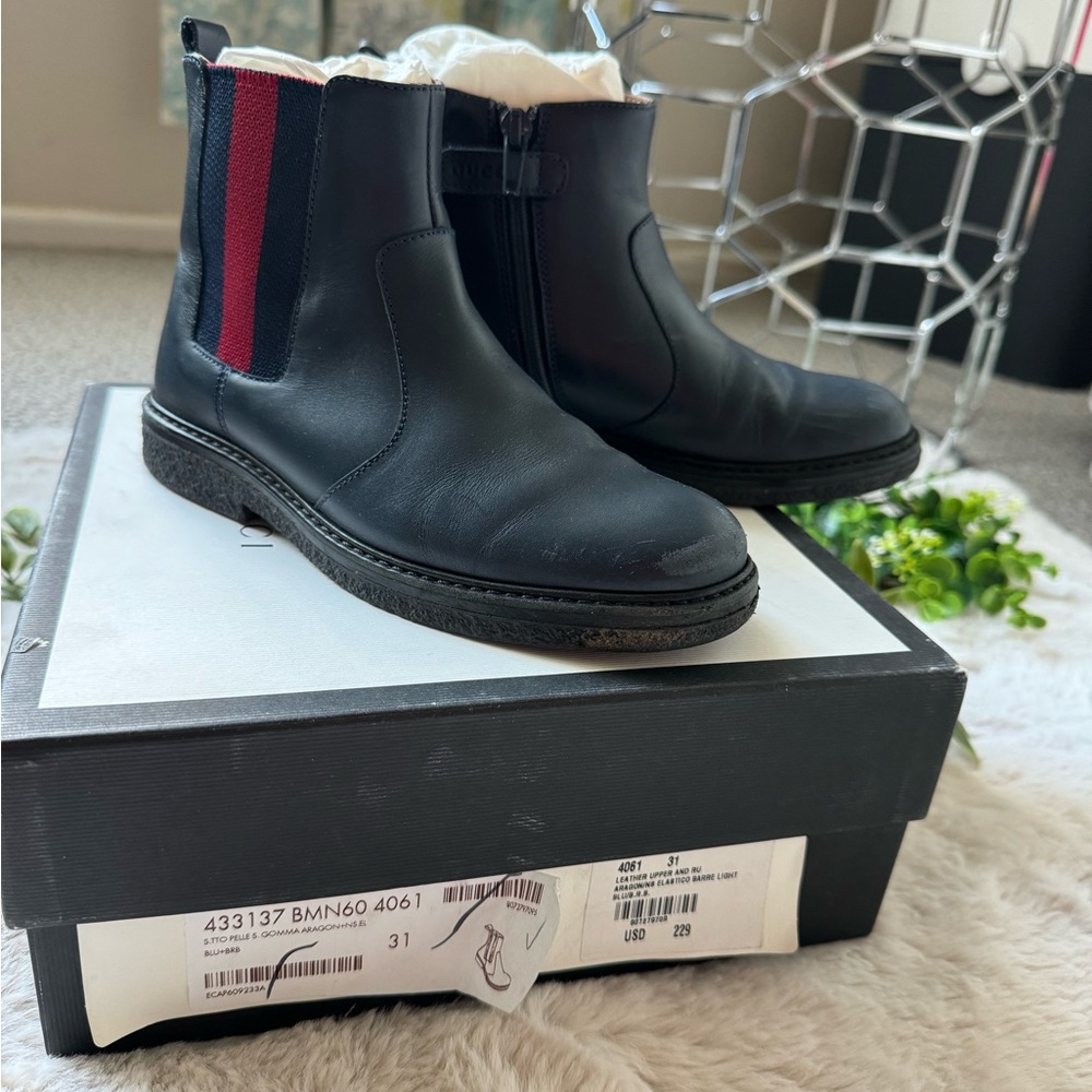 Black high top kids boots